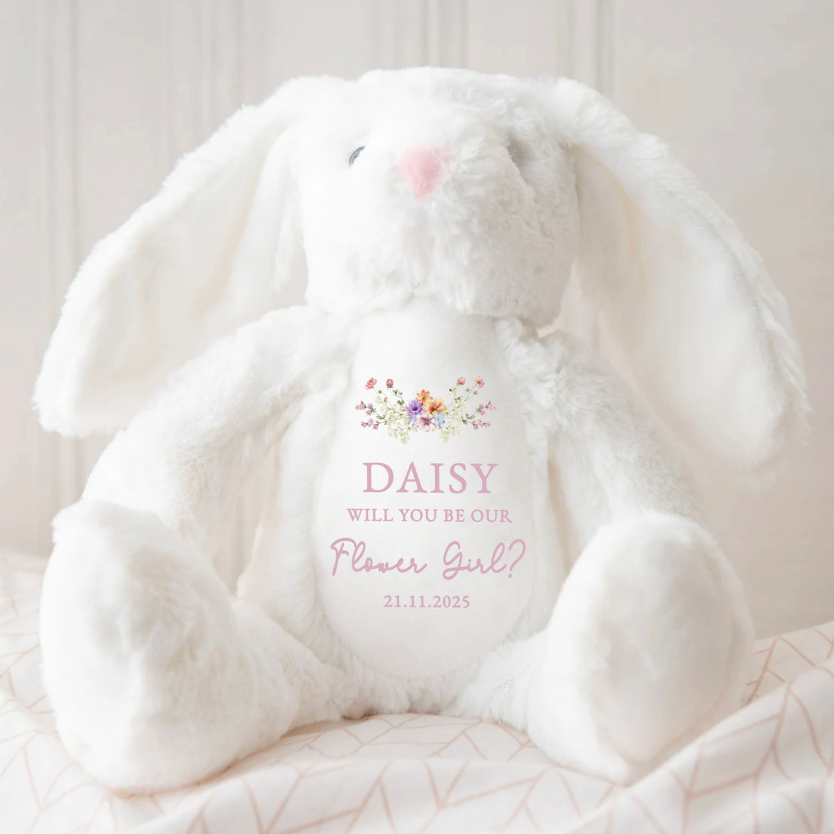 A soft white bunny toy with a personalised Flower Girl Proposal message.