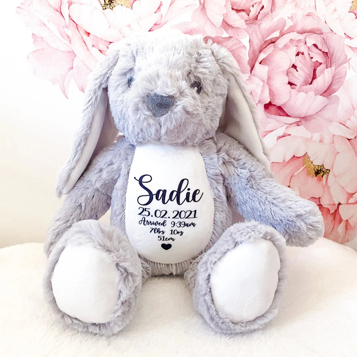 A personalised grey bunny with birth announcement details of your new baby