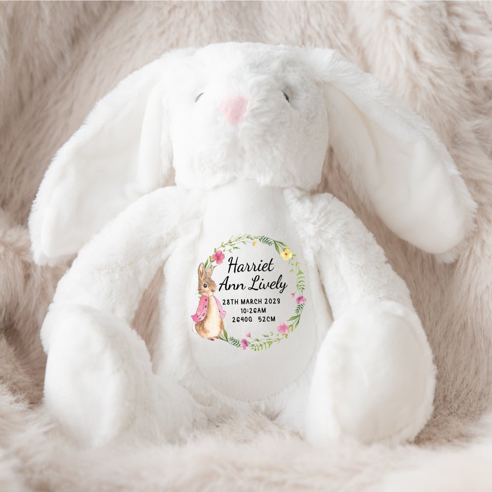 A white bunny soft toy Jellycat lookalike with new baby birth announcement in a Flopsy Rabbit design, lovingly made by Ayla & Lara.